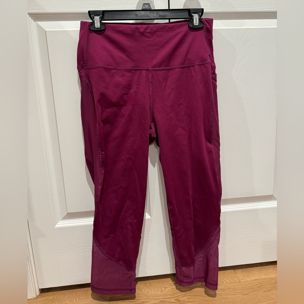 All in motion capri leggings with mesh cutouts and pockets on both legs.